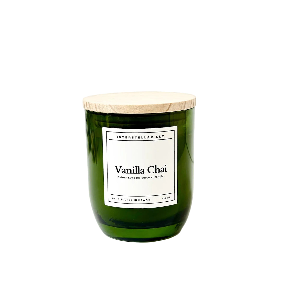 Green candle with a wooden lid labeled 'Vanilla Chai' on a white background